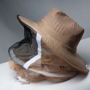 straw hat with round veil