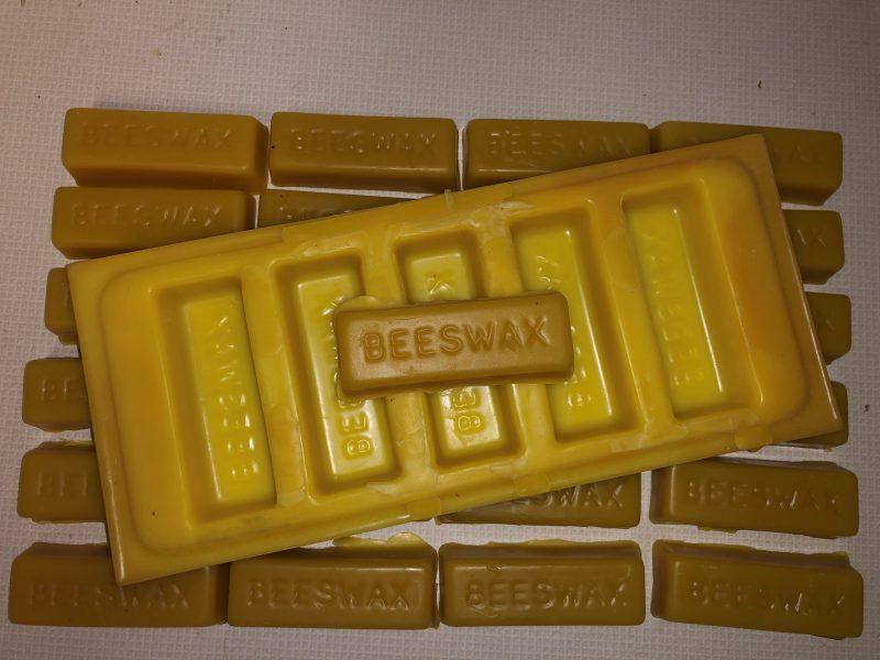 bees wax mold 1 oz being removed
